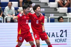 La selección femenina de fútbol sala de Vietnam celebra su victoria contra Indonesia. (Foto: FA Tailandia)