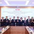 Representantes de la Comisión de Propaganda y Educación del Comité Central del Partido Comunista de Vietnam mantienen conversaciones con sus homólogos de la Comisión de Propaganda y Educación del Comité Central del PPRL (Foto: VNA)