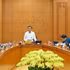 El integrante del Buró Político y miembro permanente del Secretariado del Comité Central del Partido Comunista de Vietnam, Tran Cam Tu, conduce la sesión de trabajo.