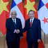 El secretario general del Partido Comunista y presidente de Vietnam, To Lam (derecha), recibe al presidente de Panamá, José Raúl Mulino. (Foto: Nhan Dan)