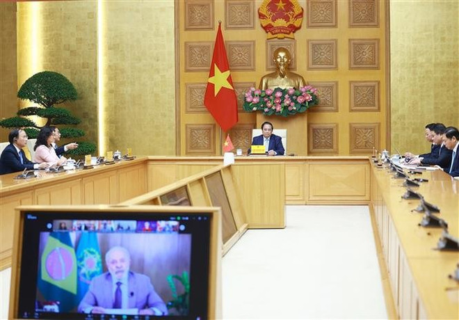El primer ministro Pham Minh Chinh habla en la cumbre. (Foto: VNA) El primer ministro Pham Minh Chinh habla en la cumbre. (Foto: VNA)