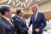 El primer ministro de Vietnam, Pham Minh Chinh, y el presidente de Estados Unidos, Joe Biden. (Foto: VNA)