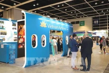 Stand de Vietnam Airlines en ITE Hong Kong 2024. (Foto: VNA)