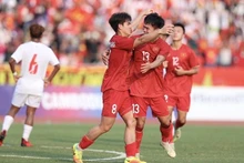 Jugadores vietnamita celebran su gol. (Foto: VNA)