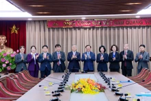 Delegados en el encuentro. (hanoionline.vn)