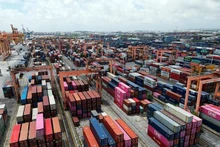 Almacén de contenedores en el puerto de Tan Vu. (Foto: VNA)