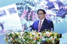 El primer ministro de Vietnam, Pham Minh Chinh, habla en el evento. (Fotografía: VNA)