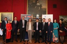 Delegados en la reunión. (Fotografía: VNA)