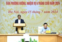 El primer ministro Pham Minh Chinh habla en la reunión. (Foto: Nhan Dan)
