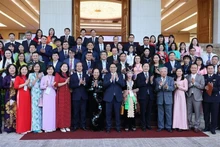 El primer ministro Pham Minh Chinh y delegados en el evento. (Foto: Nhan Dan)