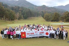 Golfistas participantes en el torneo. (Foto: VNA)