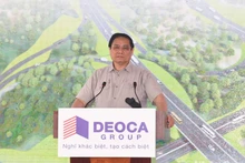 El primer ministro de Vietnam, Pham Minh Chinh, habla en el evento.