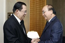 El presidente de Vietnam, Nguyen Xuan Phuc, y el primer ministro camboyano, Samdech Techo Hun Sen. (Fotografía: VNA)