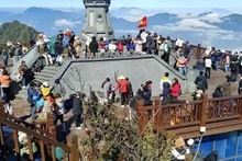 Los turistas en la provincia de Lao Cai. (Foto: VNA)