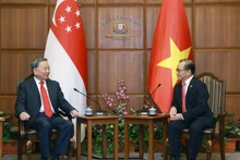 El secretario general del PCV, To Lam, se reúne con el presidente del Parlamento de Singapur, Seah Kian Peng. (Foto: VNA)