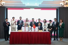 La UNH firma acuerdos de cooperación con sus socios. (Foto: qdnd.vn)