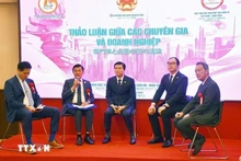 Delegados en el evento. (Foto: VNA)