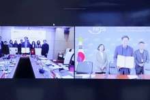La firma en línea entre el Seguro Social de Vietnam y el Servicio Nacional de Pensiones de Corea del Sur. (Foto: dangcongsan.vn)