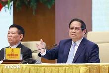 El primer ministro de Vietnam, Pham Minh Chinh, preside la reunión. (Foto: VNA)