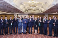 El presidente de Vietnam, Luong Cuong, y los delegados. (Foto: VNA)