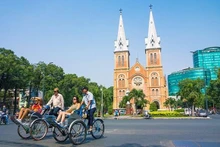 Turistas extranjeros en Ciudad Ho Chi Minh. (Fotografía: laodong.vn)