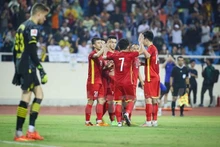 Jugadores vietnamitas celebran el gol. (Fotografía: VNA)