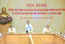 El primer ministro de Vietnam, Pham Minh Chinh (en el medio), en la cita. 