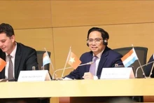 El primer ministro de Vietnam, Pham Minh Chinh, interviene en el Foro Empresarial. (Fotografía: VNA)