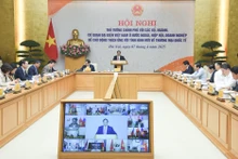 [Foto] Premier vietnamita preside conferencia sobre la adaptación a la nueva situación