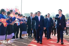 El primer ministro de Vietnam, Pham Minh Chinh, y su par de Laos, Sonexay Siphandone, en el evento.