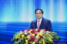 El primer ministro vietnamita, Pham Minh Chinh, habla en la ceremonia.
