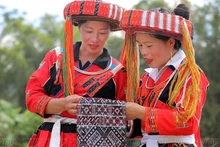 Las mujeres de Pa Then siempre están orgullosas de su traje tradicional.