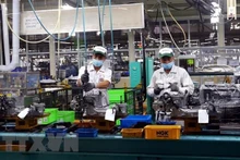 Actividades de producción en la filial del grupo Toyota en Vietnam (Fotografía: VNA)