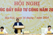 El primer ministro Pham Minh Chinh, preside la conferencia.