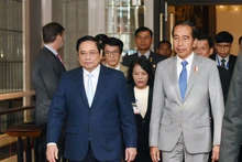 El primer ministro de Vietnam, Pham Minh Chinh, y el presidente de Indonesia, Joko Widodo, llegan al evento.
