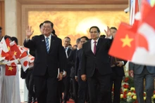 [Foto] Ceremonia de firma de documentos de cooperación Vietnam-Japón