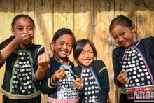 Día Internacional de la Felicidad: Sonrisas felices de grupos étnicos vietnamitas