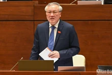 El presidente del Tribunal Popular Supremo, Nguyen Hoa Binh, rinde cuentas en la sesión parlamentaria. (Fotografía: Nhan Dan)