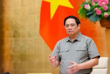 El primer ministro Pham Minh Chinh habla en el evento. (Fotografía: VGP)