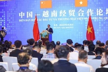 En el Foro de Cooperación Comercial y de Inversión Vietnam-China, en Pekín, el 28 de junio. (Foto: baochinhphu.vn)