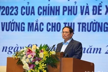 El primer ministro Pham Minh Chinh habla en la conferencia.
