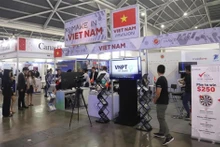 En el stand de Vietnam (Fotografía: VNA)