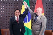El primer ministro vietnamita, Pham Minh Chinh, se reúne con el presidente brasileño, Lula da Silva, en mayo de 2023. (Foto: VNA)