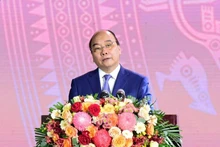 El presidente de Vietnam, Nguyen Xuan Phuc habla en el evento.