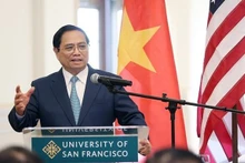 El primer ministro de Vietnam, Pham Minh Chinh, habla en el encuentro. (Fotografía: VNA)