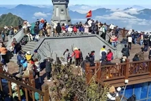 Los turistas en la provincia de Lao Cai (Foto: VNA)