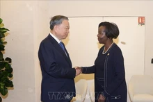 El secretario general del Partido Comunista y presidente de Vietnam, To Lam, y la secretario general de la Organización Internacional de la Francofonía (OIF), Louise Mushikiwabo. (Foto: VNA)