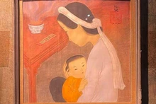La obra "Madre e hijo frente al altar" de Mai Trung Thu. (Fuente: Internet)
