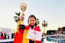 La ajedrecista vietnamita Nguyen Vu Bao Chau celebra el triunfo (Foto: tdtt.gov.vn)