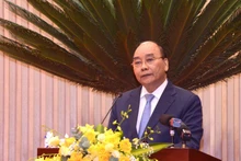 El presidente Nguyen Xuan Phuc habla en el evento. (Fotografía: daibieunhandan.vn)